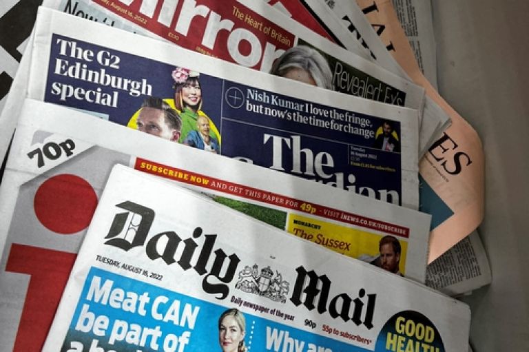 Image of newspapers spread, with parts of their names visible: The Guardian, The Times, the Daily Mail, the i, the Financial Times